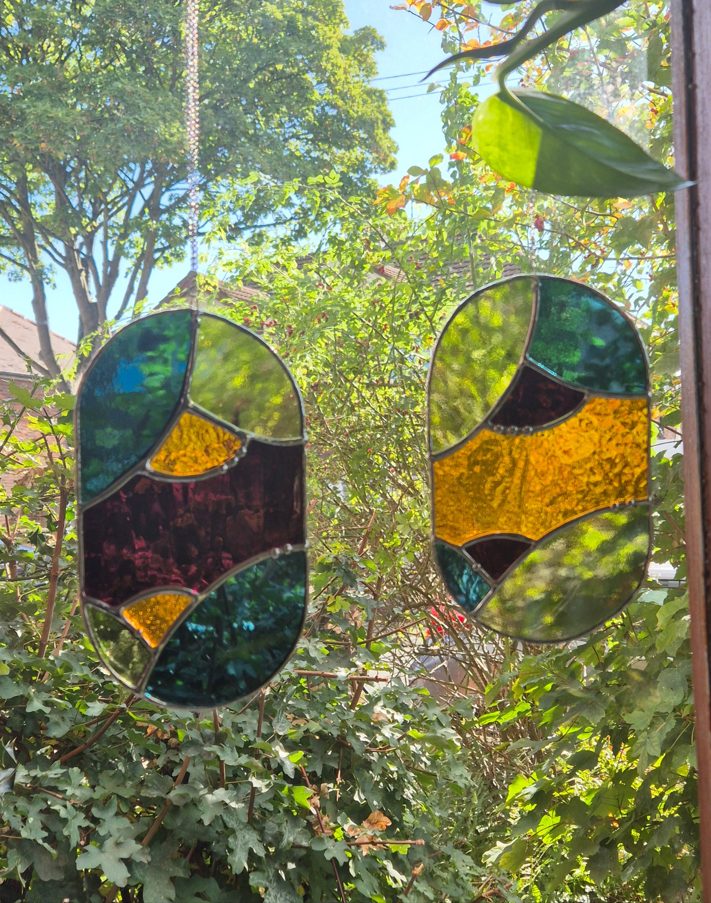 Abstract Oval Hanging Panel 1