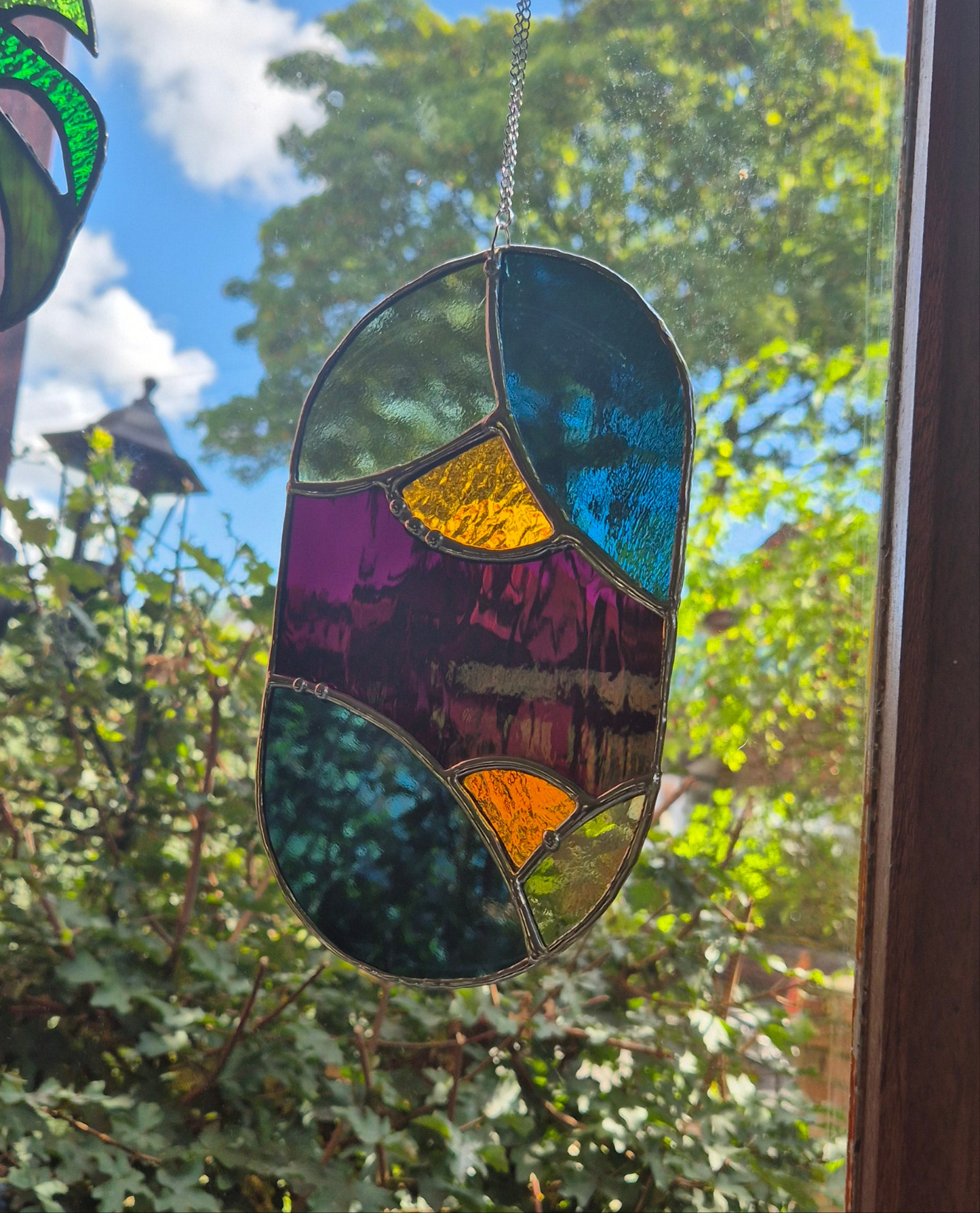 Abstract Oval Hanging Panel 1