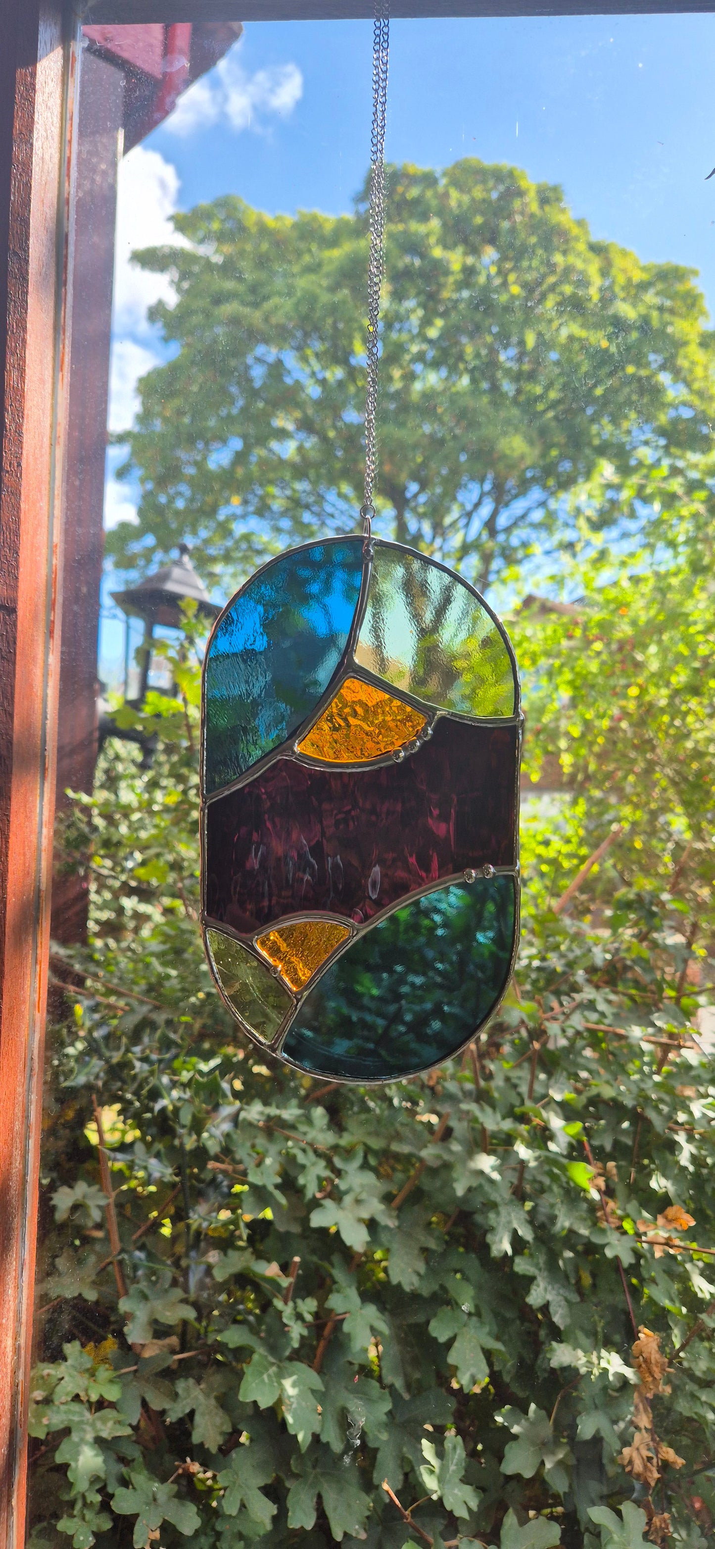 Abstract Oval Hanging Panel 1
